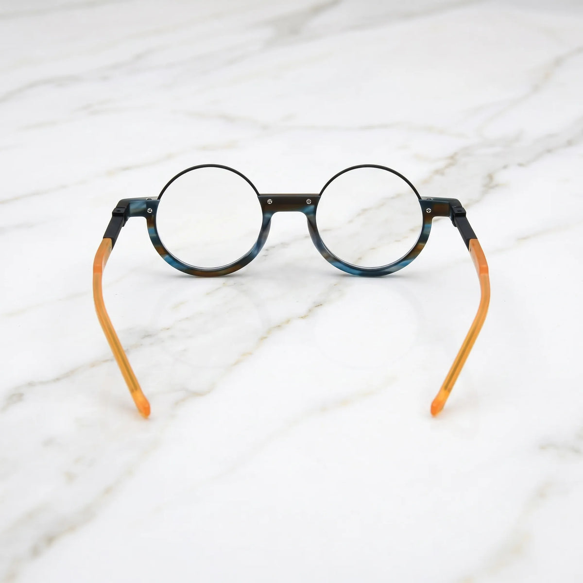 Back view of Ocean Tortoiseshell glasses with layered blue-black acetate blend and smooth curve finish.