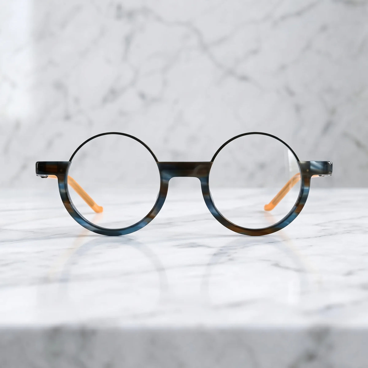 Front view of Ocean Tortoiseshell VoyueLens eyeglasses featuring deep blue tones and soft tortoise layering.