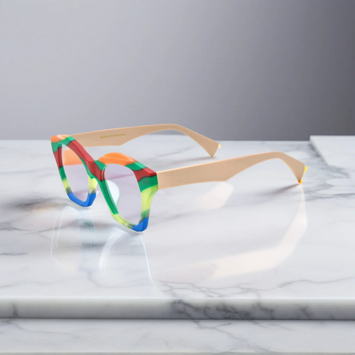 Side profile of VoyueLens Rainbow Cream cat-eye frame showing elegant acetate curvature and temple detail.