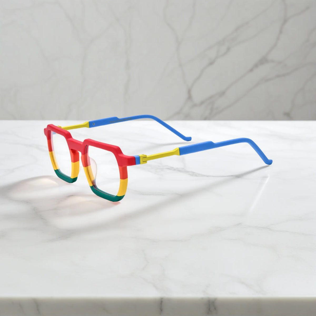 Side angle of VoyueLens Rainbow Rush statement frames with multi-color gradient detailing and sculpted acetate arms in tortoiseshell