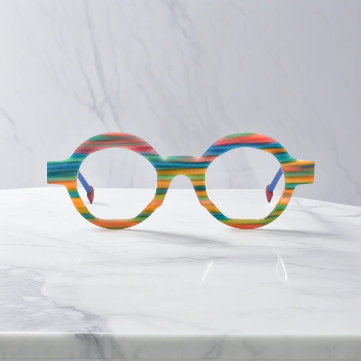 Front-facing view of VoyueLens VL19355 Rainbow Stripe polygon eyeglasses featuring colorful matte acetate frame and bold design, perfect for prescription lenses