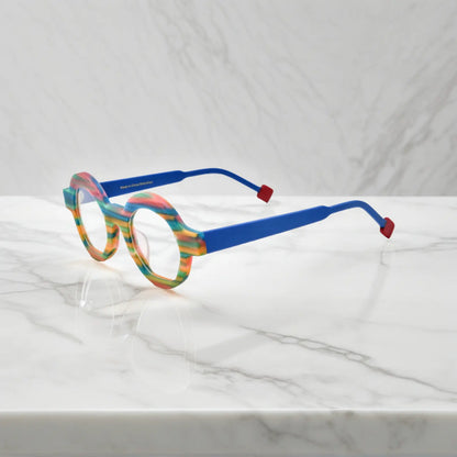 Side view of Rainbow Stripe VoyueLens VL19355 glasses showing multi-color matte acetate temples and geometric polygon silhouette