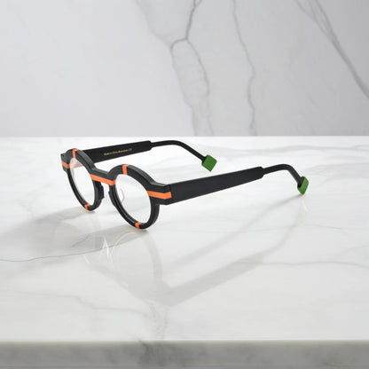 Side view of VoyueLens Retro Geometric Round Glasses in charcoal black with matte-finished flexible temples.