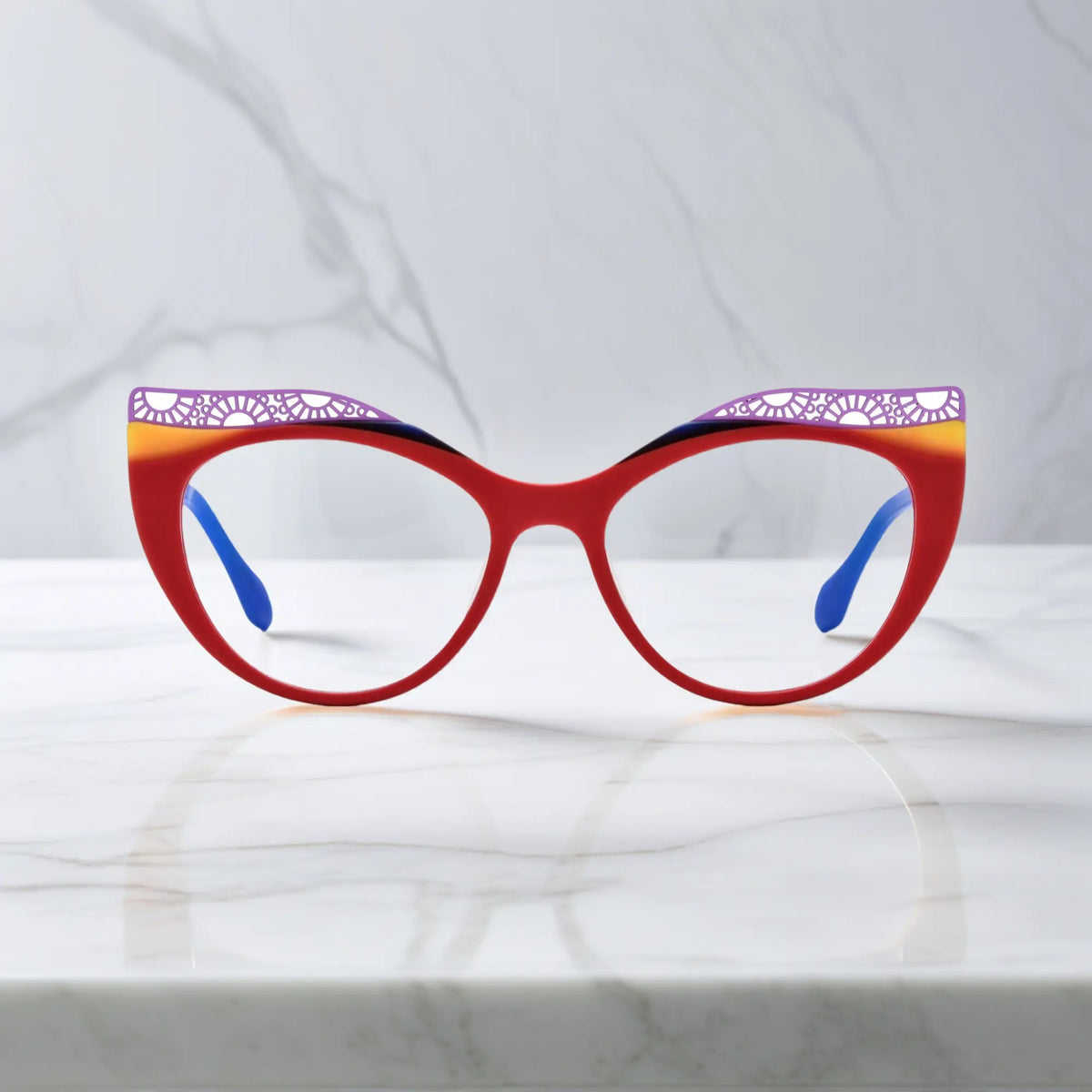 Front View of VoyueLens Scarlet Horizon cat-eye eyeglasses with red-to-orange gradient and signature lace-pattern design.