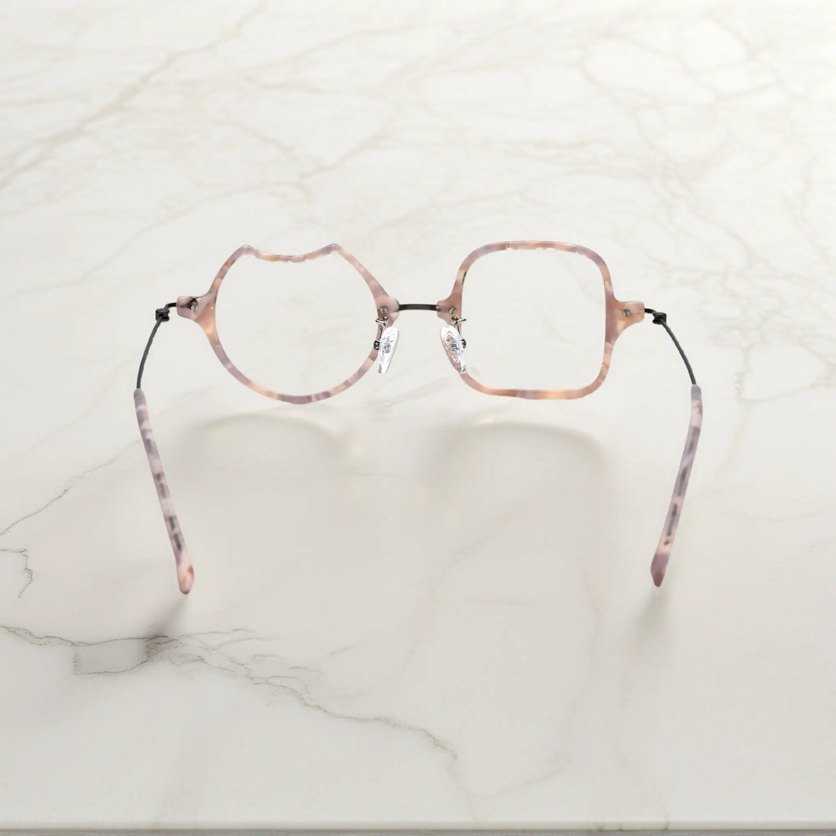 Back View of VoyueLens Shell Pink dual-shaped artistic eyeglasses VL185842-C3. Rear view displaying the acetate frame and the titanium temple connection structure.
