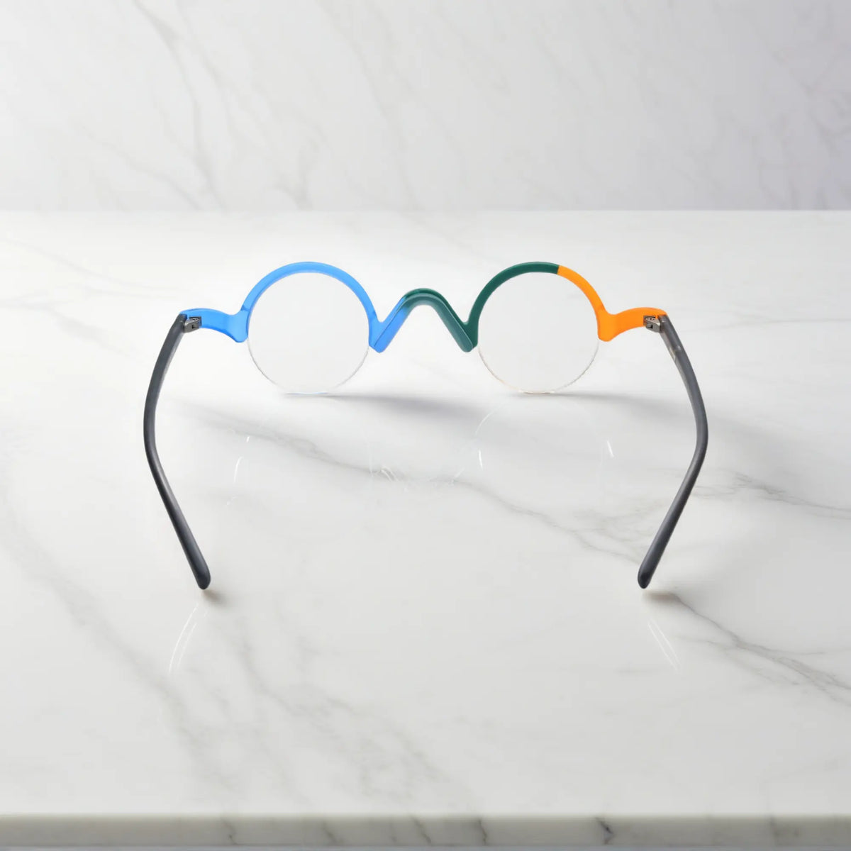 Rear view of VoyueLens Teal-Blue semi-rimless browline eyeglasses highlighting construction details.