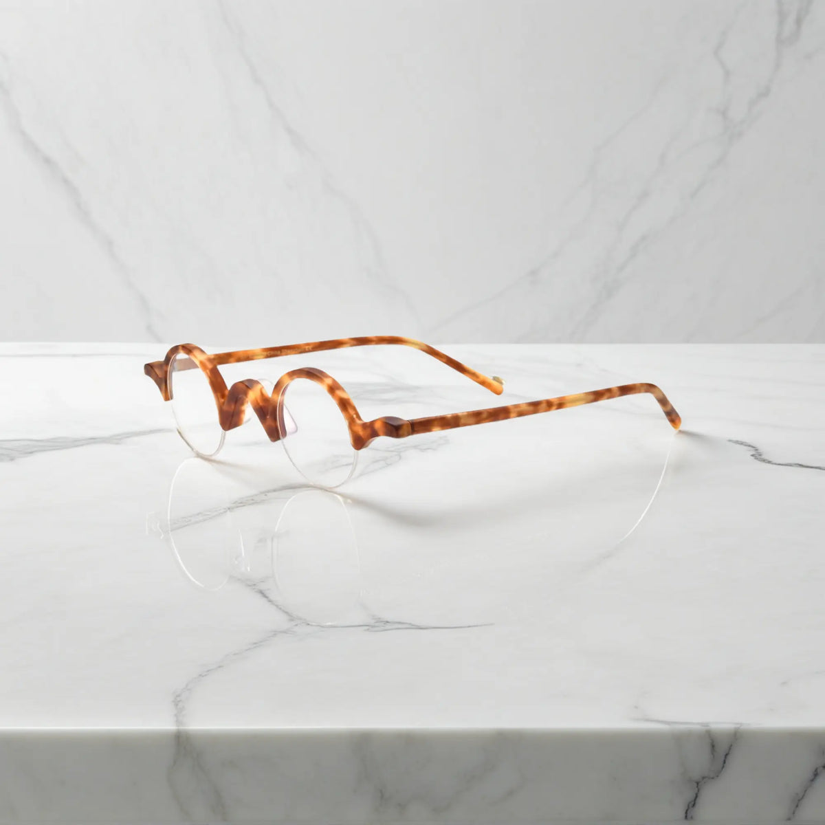 Side perspective of VoyueLens Tortoiseshell semi-rimless browline eyeglasses showcasing matte acetate structure.