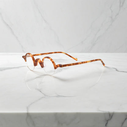 Side perspective of VoyueLens Tortoiseshell semi-rimless browline eyeglasses showcasing matte acetate structure.