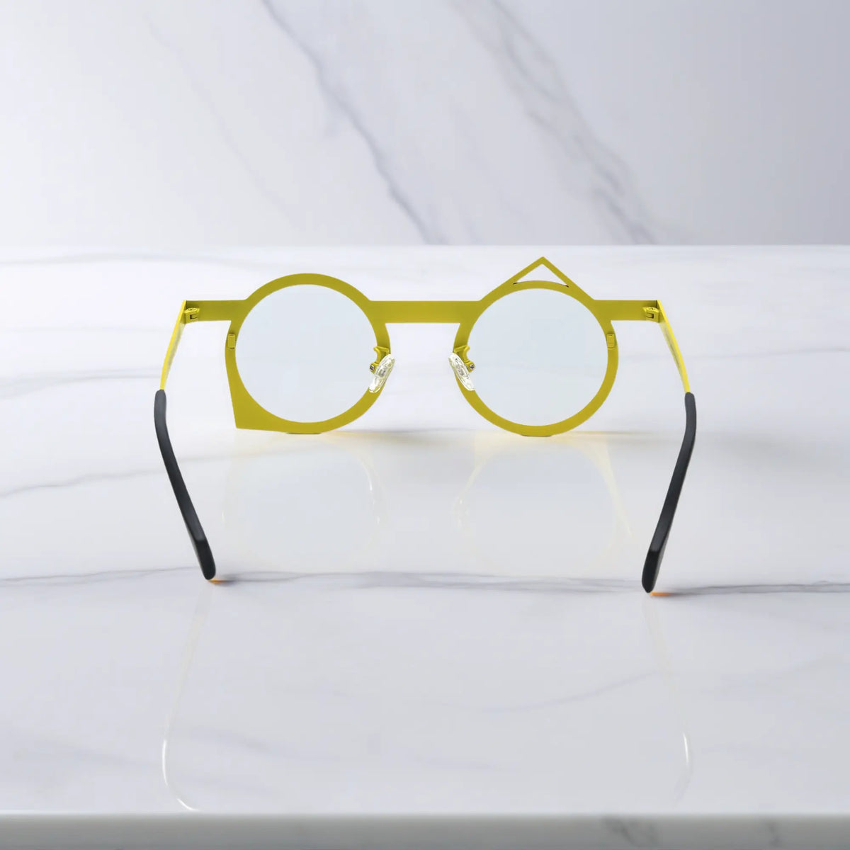 Back view of VoyueLens VL185801 titanium glasses in Violet Mustard, highlighting the sculpted dual-color frame.