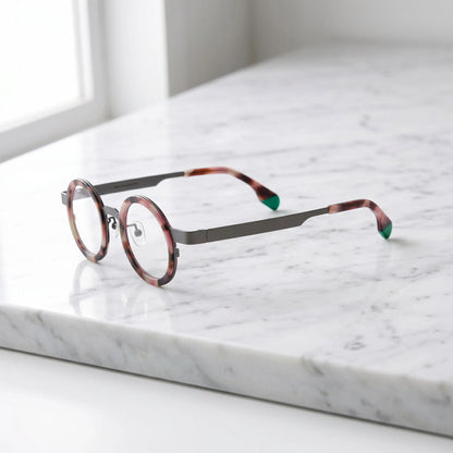 Side profile of Ash Leopard titanium round glasses