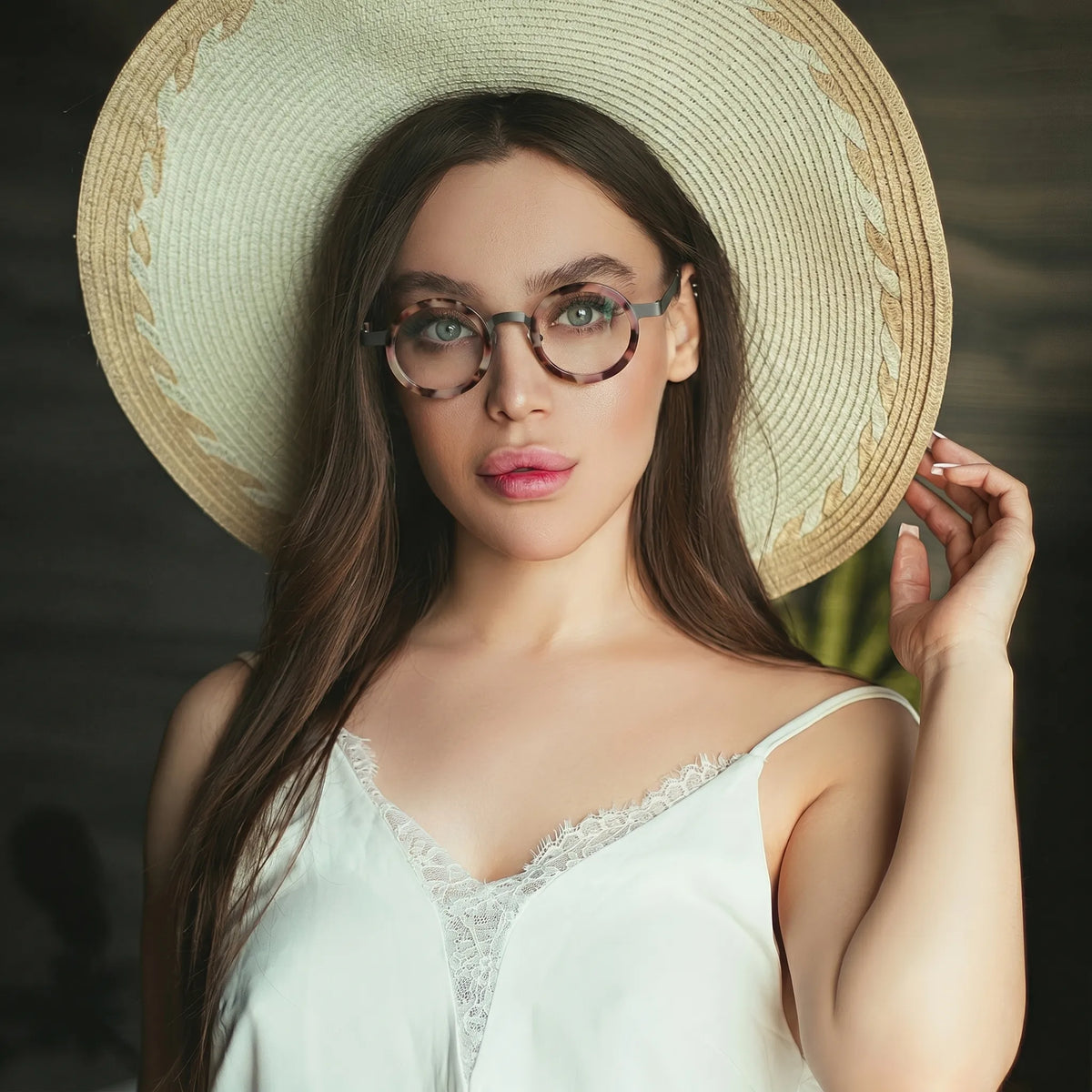 Model wearing Ash Leopard titanium eyeglasses