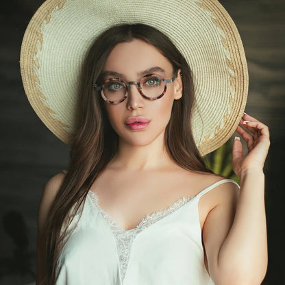 Model wearing Ash Leopard titanium eyeglasses
