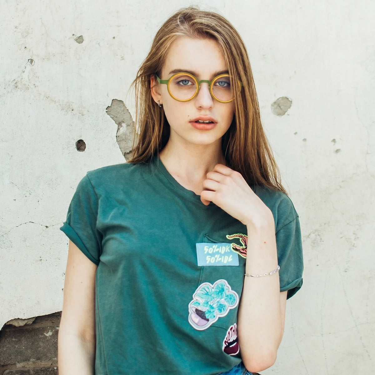 Model wearing Olive Citrus titanium eyeglasses