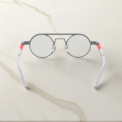 Rear angle displaying the ergonomic nose pads and lightweight design in Chrome Ember sleek silver titanium frame with a subtle industrial edge