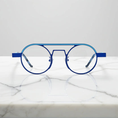 Front view of VoyueLens NeoPilot aviator glasses in Glacier Blue icy titanium aviator frame with a cool, futuristic tone