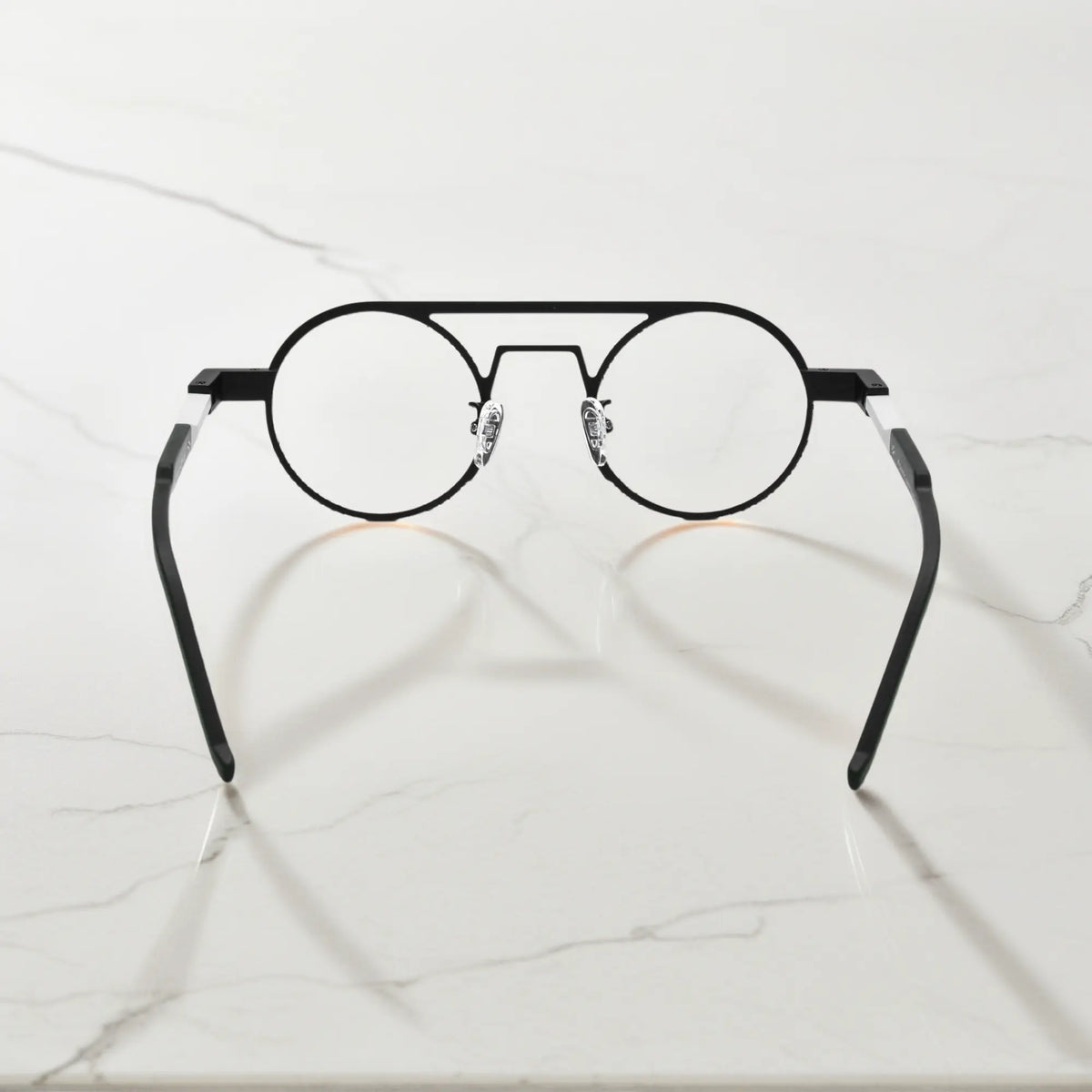 Rear angle displaying the ergonomic nose pads and lightweight design in Graphite Black matte titanium frame for a modern minimalistic look