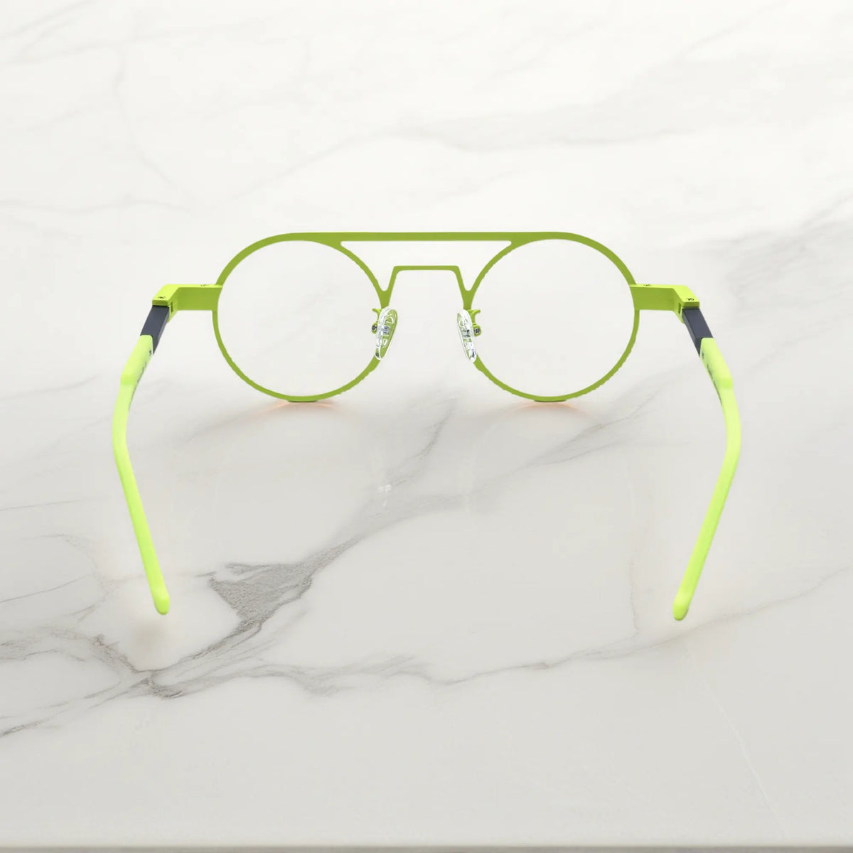 Rear angle displaying the ergonomic nose pads and lightweight design in Neon Moss bold green colorway for statement-making eyewear