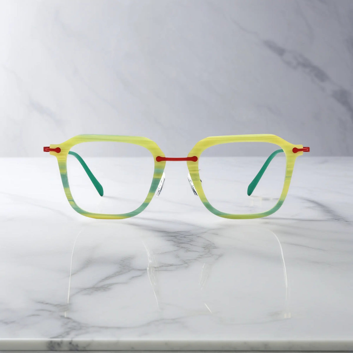 Front-facing view of VoyueLens Urban Vision eyeglasses in Citrus Mist, highlighting the refreshing striped yellow-green frame.