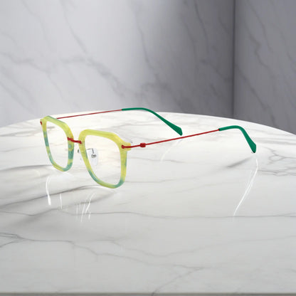 Angled side perspective showing the lightweight titanium temples and vibrant Citrus Mist colorway.