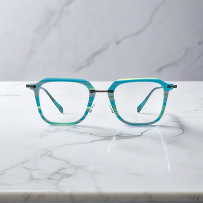 Front angle of Glacier Teal frame with a cool-toned oceanic finish from VoyueLens.