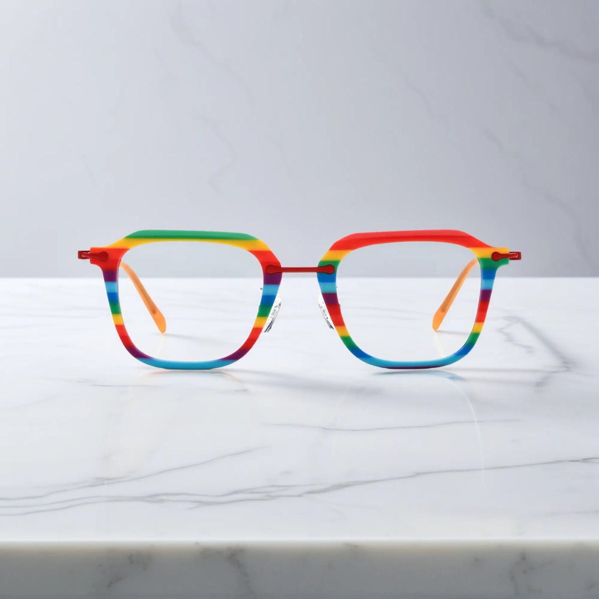 Front shot of VoyueLens Urban Vision eyeglasses in Rainbow Parade with a bold multicolor front.