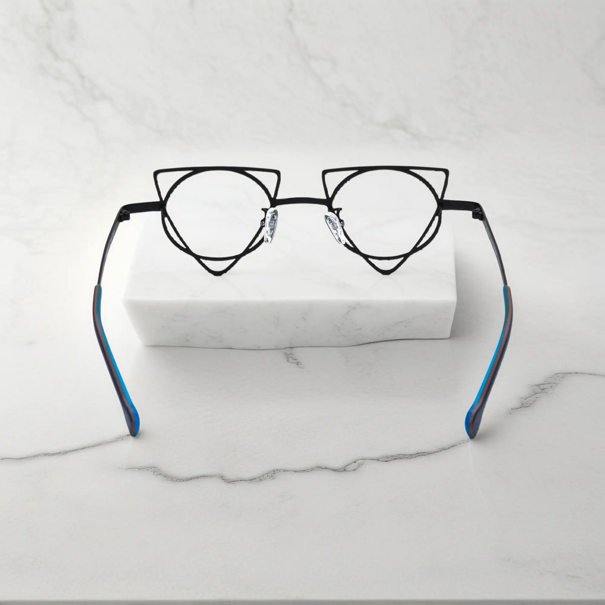 Back angle revealing artistic frame curves of VoyueLens Lime Black geometric glasses, crafted from lightweight titanium