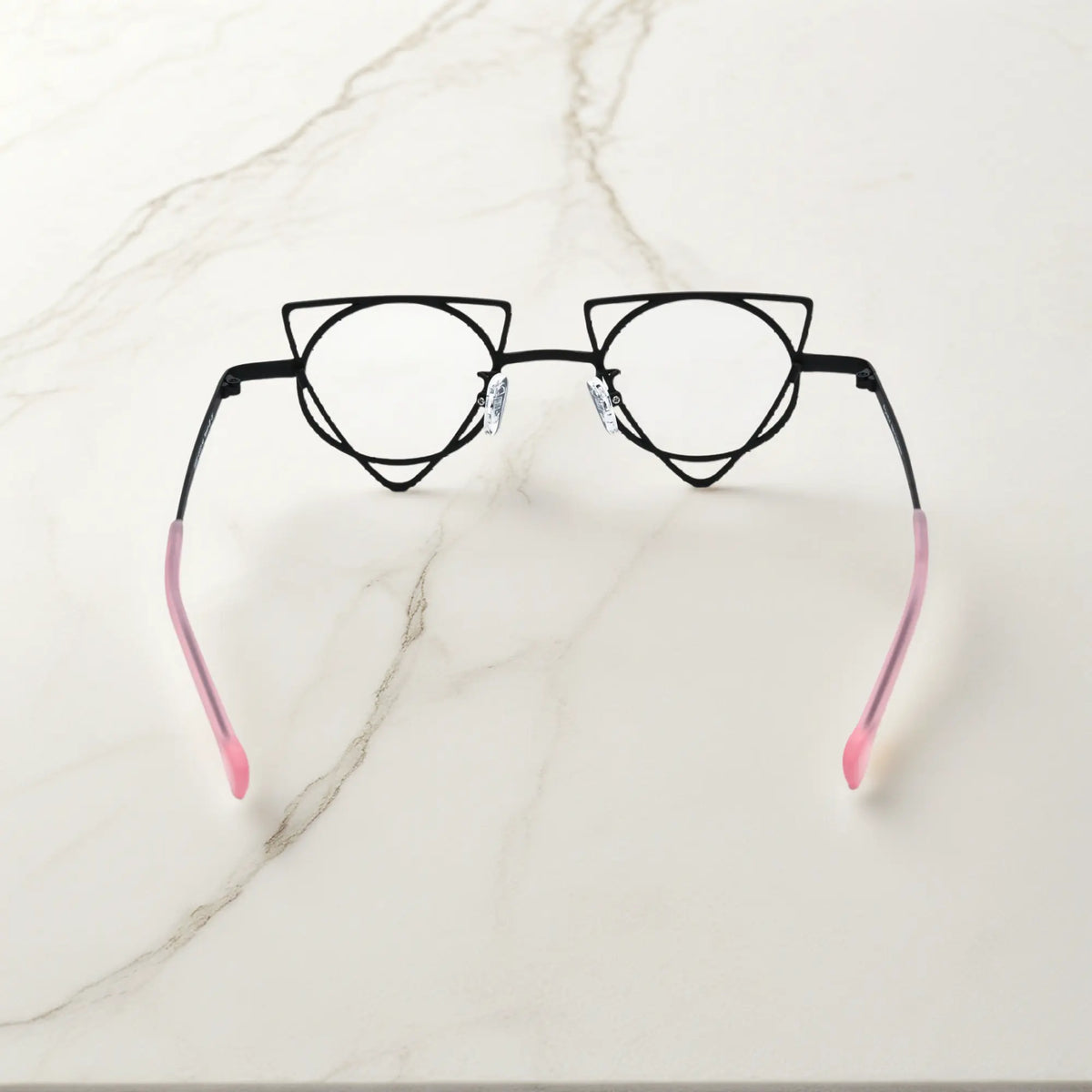 Back angle revealing artistic frame curves of VoyueLens Matte Black geometric glasses, crafted from lightweight titanium