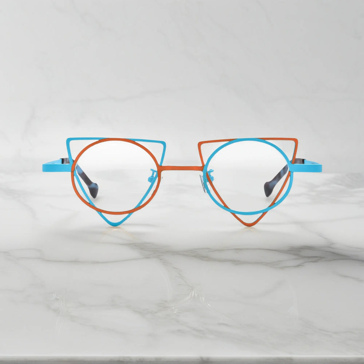 Front view of VoyueLens Tangerine Blue geometric titanium eyeglasses with statement frame design, unisex fashion eyewear