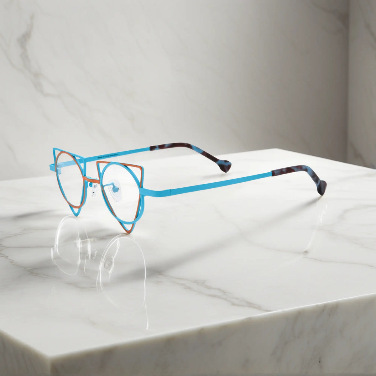 Side profile showing slim titanium temples of VoyueLens Tangerine Blue designer eyeglasses, ideal for modern optical styling