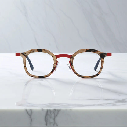 Front view of VoyueLens Crimson Drift square eyeglasses with a warm red acetate front with amber pattern and clean titanium temples.