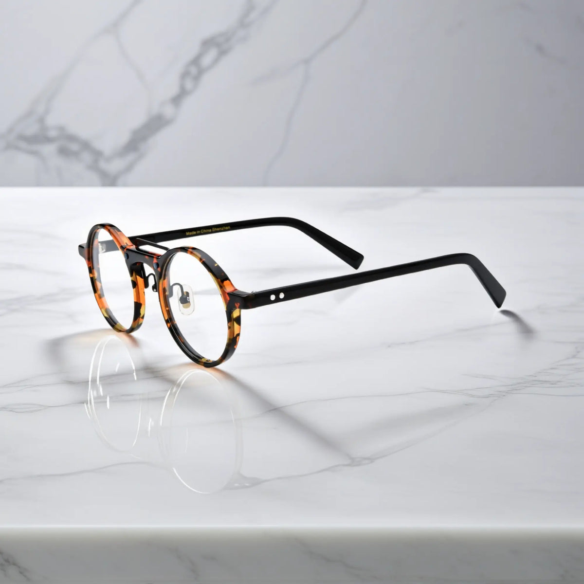 Side view of VoyueLens VL19194-C1 Black Tortoise eyeglasses showing lightweight temple arms and adjustable nose pads