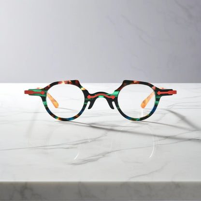 Front view of VoyueLens VL19341 glasses in green flame tortoise acetate, combining deep green with red and amber streaks for bold styling.