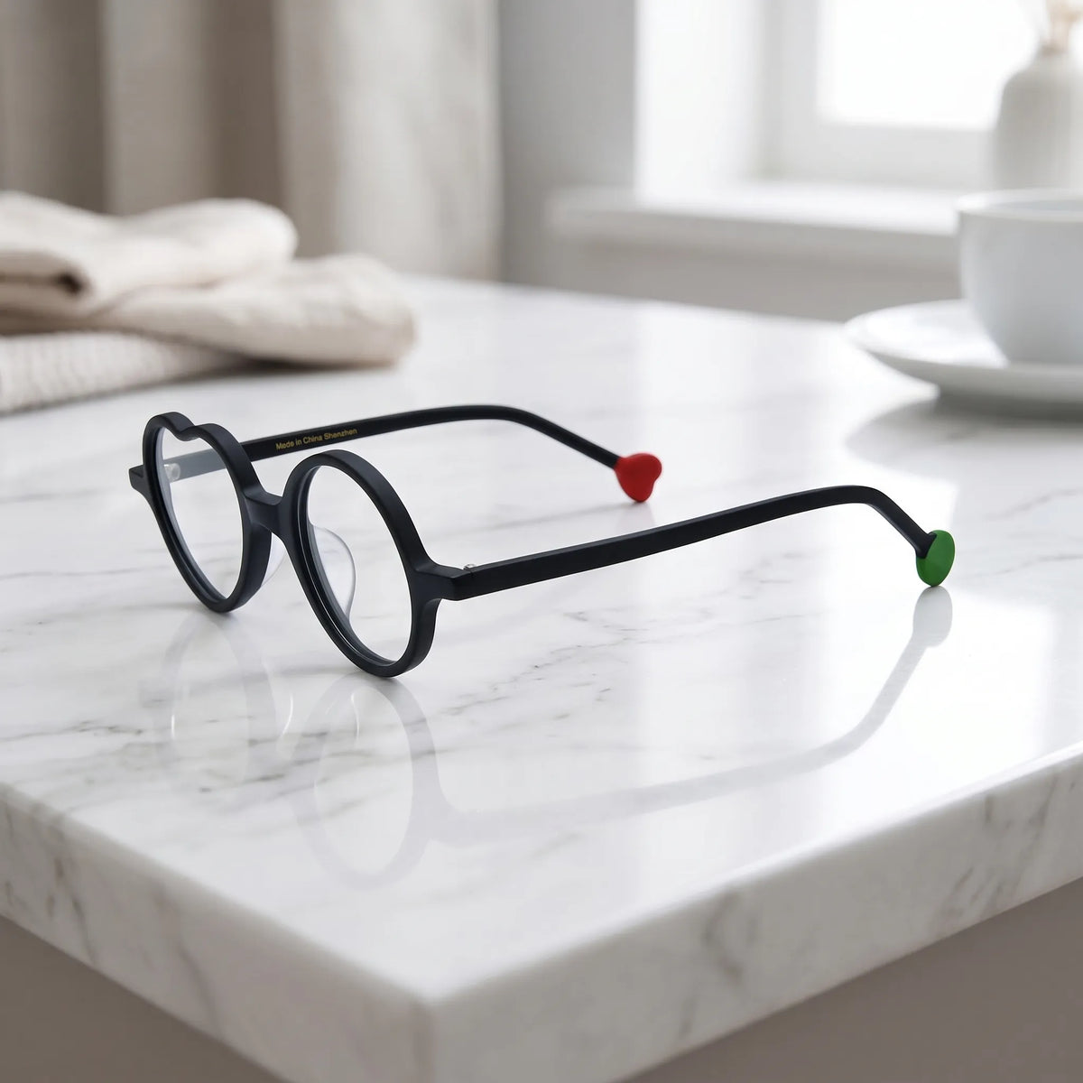 Side view of Charcoal Dusk variant, showcasing frame thickness and temple arm structure. Minimalist all-black frame with subtle matte texture and modern shape.