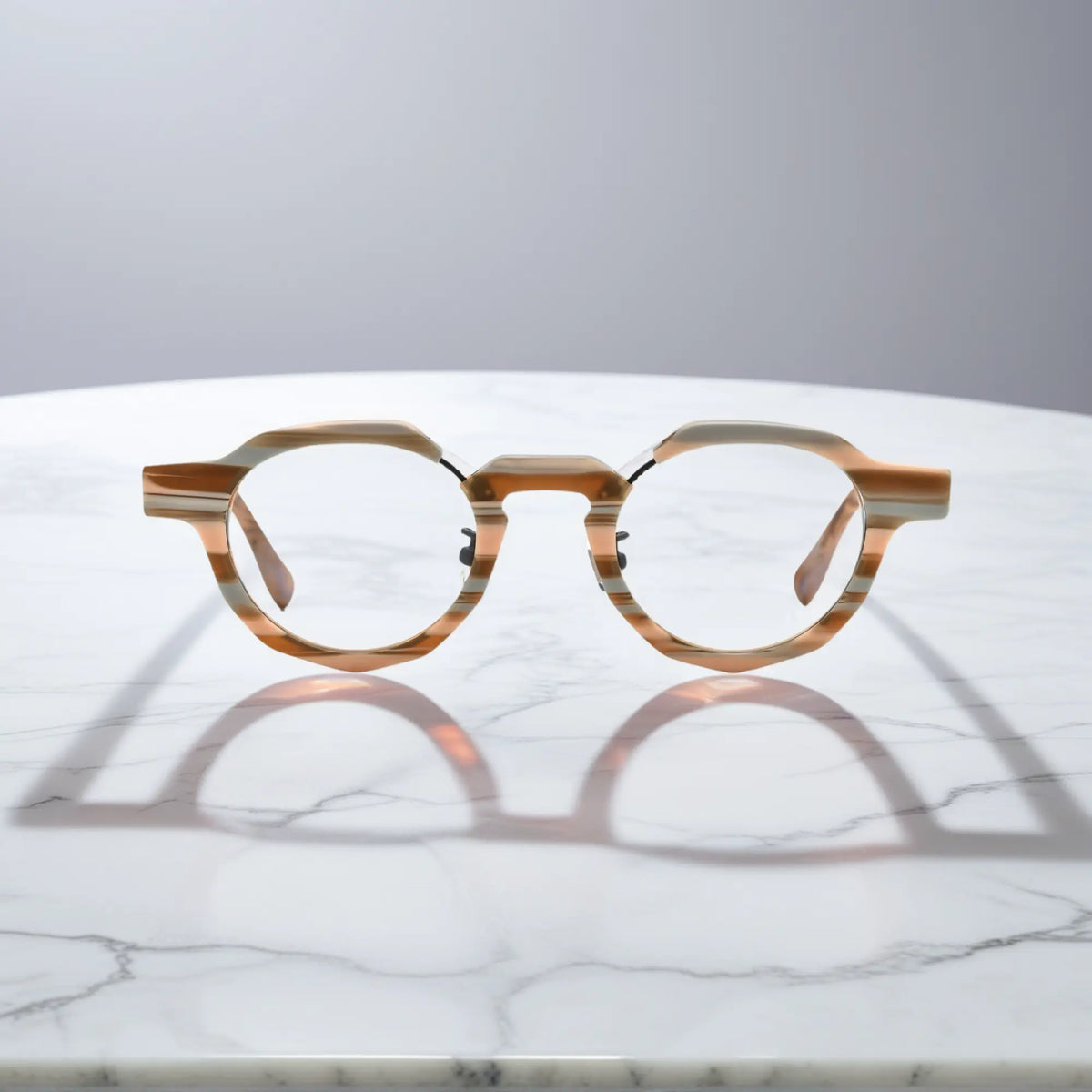 Front view of VoyueLens Amber Drift VL19378 eyeglasses with warm amber striped frame