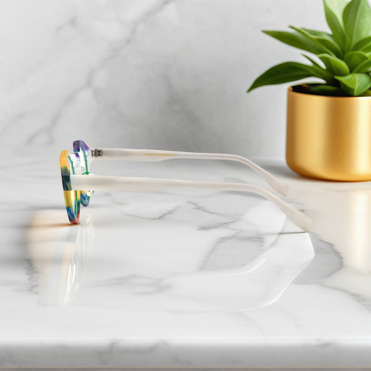 Side profile of VoyueLens Rainbow Frost eyeglasses showing matte white temples and colorful rims