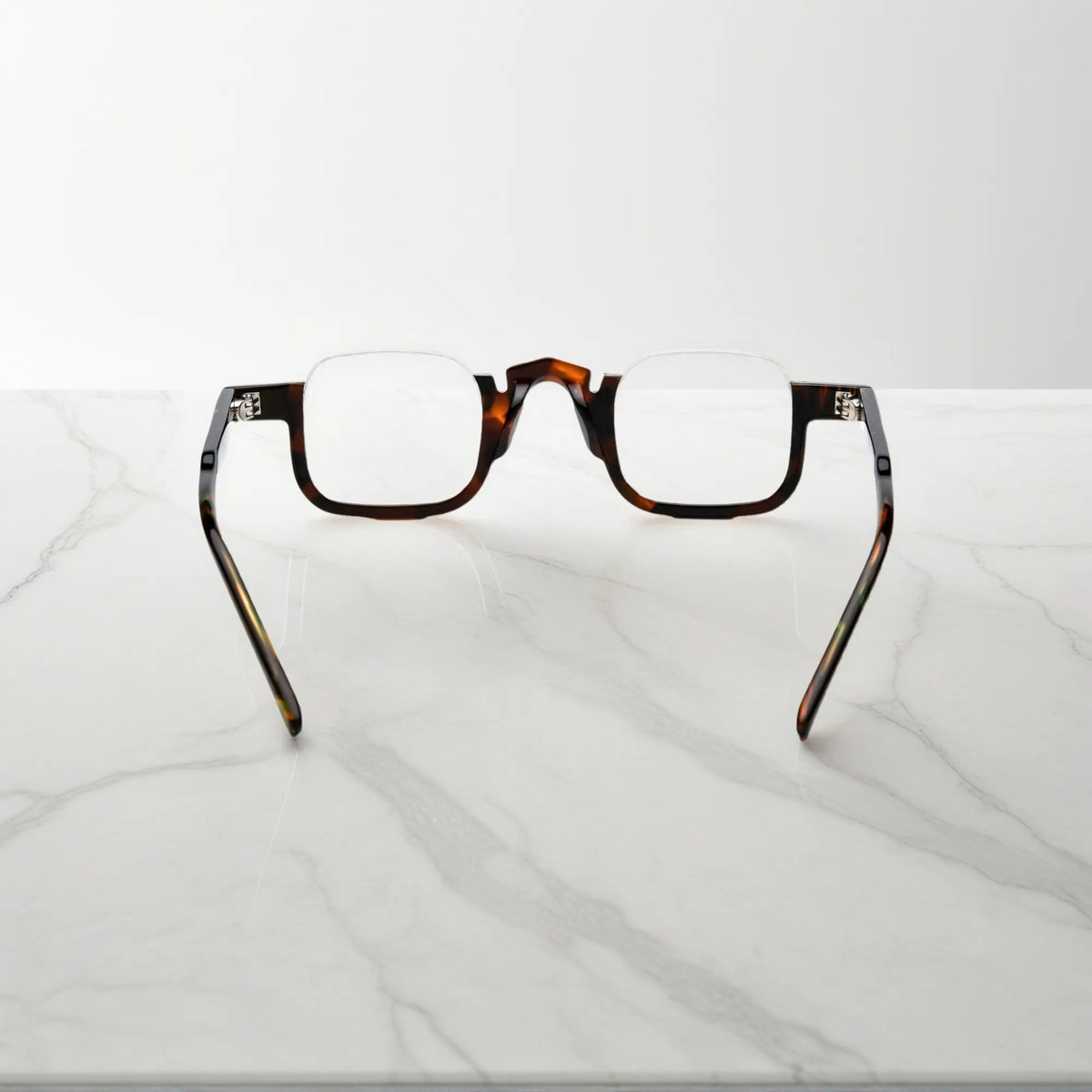 Back view of VoyueLens acetate eyeglasses in warm tortoise color, lightweight square prescription-ready frame