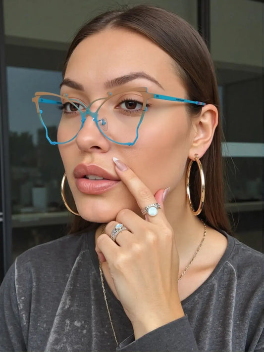VoyueLens cat-eye eyeglasses in yellow and blue frame, worn by a woman with hoop earrings, showing bold retro-futuristic style – SKU VL185862.