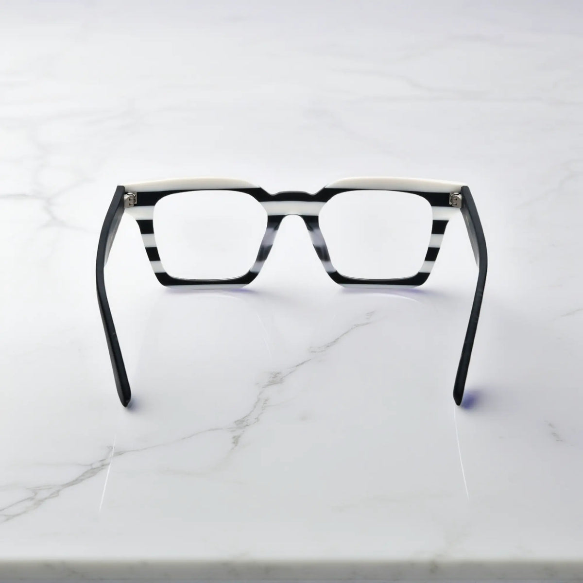 Back view of Zebra Noir eyeglasses in Zebra Noir – black and white striped color block design