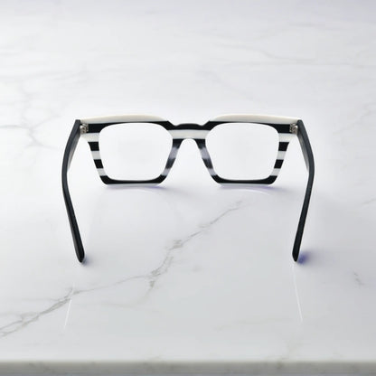 Back view of Zebra Noir eyeglasses in Zebra Noir – black and white striped color block design