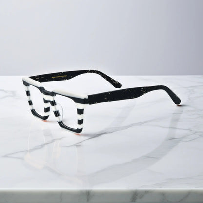 Side view of Zebra Noir eyeglasses in Zebra Noir – black and white striped color block design